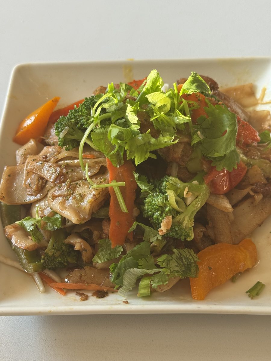 Ginger lemongrass stir-fry with broccoli, bell pepper and pork over rice